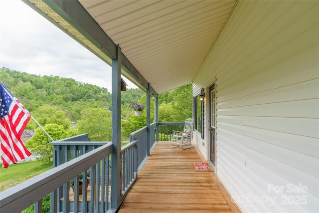 234 Snyder Farm Rd, Waynesville, NC 28786 - wooden porch with a view of trees