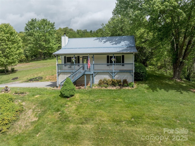 234 Snyder Farm Rd, Waynesville, NC 28786 - view of front of house with covered porch, a chimney, a front yard, and stairway