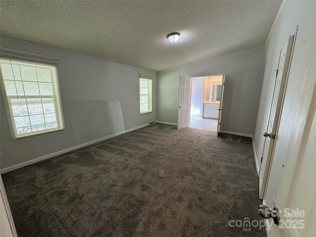 40 Mountainview Rd, Asheville, NC 28806 - unfurnished bedroom with a textured ceiling, carpet floors, and baseboards