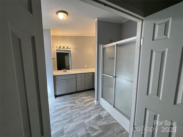 40 Mountainview Rd, Asheville, NC 28806 - full bathroom with a shower stall, crown molding, vanity, and a textured ceiling