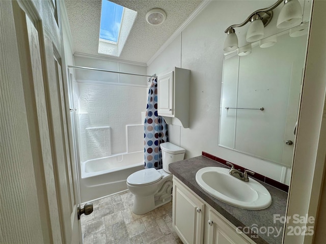 40 Mountainview Rd, Asheville, NC 28806 - bathroom featuring a skylight, crown molding, a textured ceiling, toilet, and vanity
