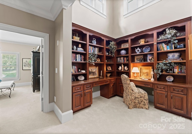 143 Jeremy Point Pl, Mooresville, NC 28117 - home office featuring built in desk, light colored carpet, and crown molding