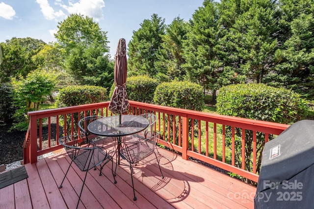 7245 Willow Brook Ct, Denver, NC 28037 - deck with outdoor dining area and view of wooded area