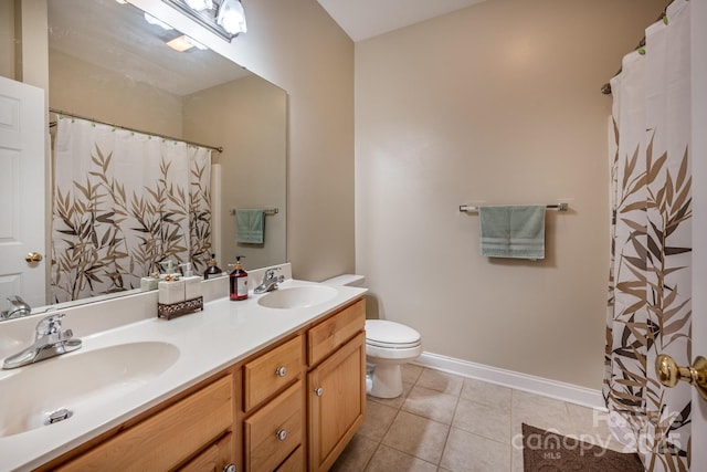 7245 Willow Brook Ct, Denver, NC 28037 - full bath with toilet, tile patterned floors, double vanity, and baseboards