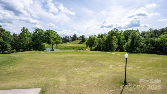 7245 Willow Brook Ct, Denver, NC 28037 - surrounding community with golf course view, a water view, a yard, and view of wooded area