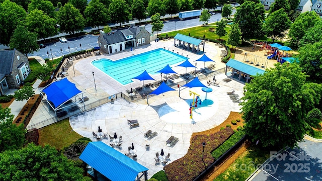 bird's eye view of a pool area and a park