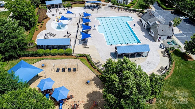 drone / aerial view of a pool