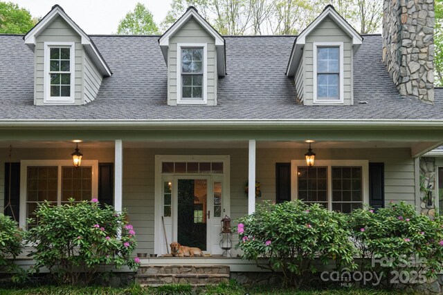 4398 Mud Puddle Ln, Lenoir, NC 28645 - cape cod-style house featuring a porch and roof with shingles