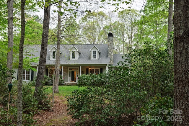 4398 Mud Puddle Ln, Lenoir, NC 28645 - cape cod home with a chimney and a porch