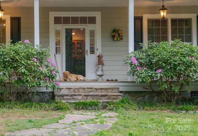 4398 Mud Puddle Ln, Lenoir, NC 28645 - view of exterior entry with covered porch