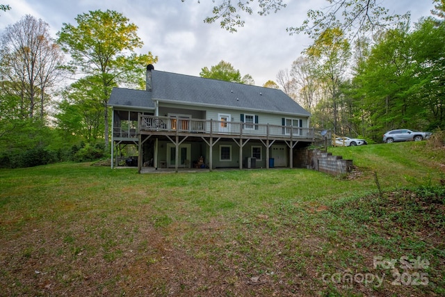 4398 Mud Puddle Ln, Lenoir, NC 28645 - back of property with a deck, a lawn, a chimney, and cooling unit