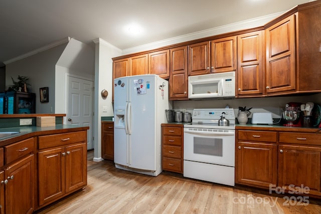 4398 Mud Puddle Ln, Lenoir, NC 28645 - kitchen featuring white appliances, crown molding, light wood-style floors, brown cabinetry, and dark countertops