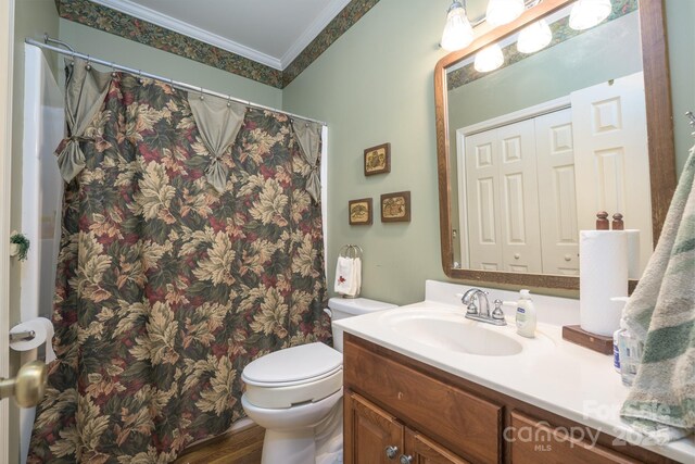 4398 Mud Puddle Ln, Lenoir, NC 28645 - full bath with crown molding, vanity, toilet, wood finished floors, and curtained shower
