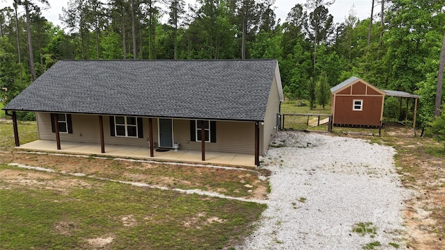 200 Mosley Rd, Blacksburg, SC 29702 - view of front of property featuring gravel driveway, a wooded view, and an outbuilding