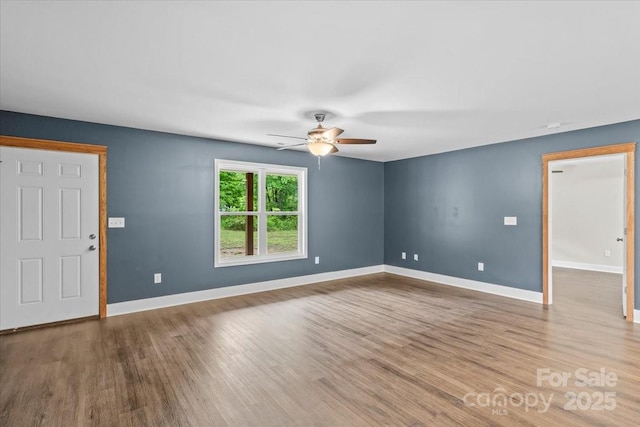 200 Mosley Rd, Blacksburg, SC 29702 - spare room with ceiling fan, wood finished floors, and baseboards