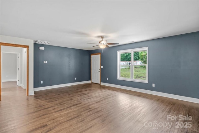 200 Mosley Rd, Blacksburg, SC 29702 - unfurnished room featuring ceiling fan, wood finished floors, and baseboards