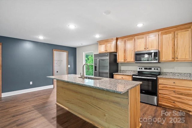 200 Mosley Rd, Blacksburg, SC 29702 - kitchen featuring appliances with stainless steel finishes, a sink, baseboards, dark wood-type flooring, and an island with sink