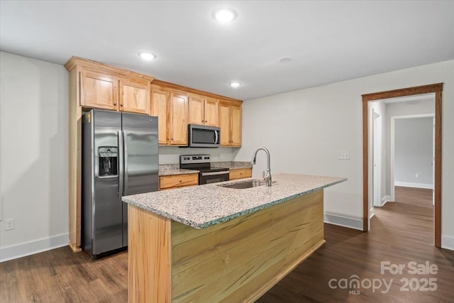 200 Mosley Rd, Blacksburg, SC 29702 - kitchen featuring appliances with stainless steel finishes, a sink, dark wood-style floors, a center island with sink, and recessed lighting