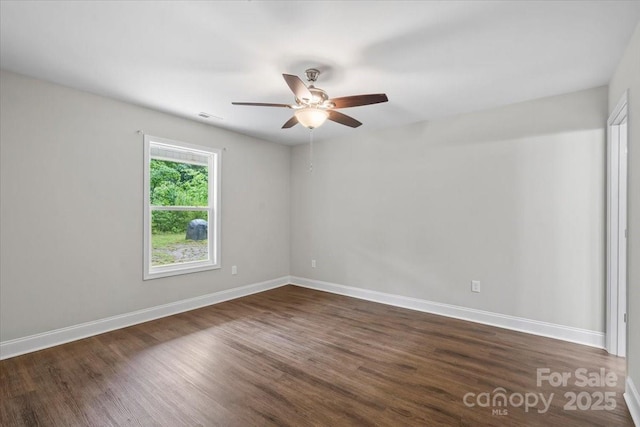 200 Mosley Rd, Blacksburg, SC 29702 - unfurnished room with ceiling fan, dark wood-style floors, and baseboards