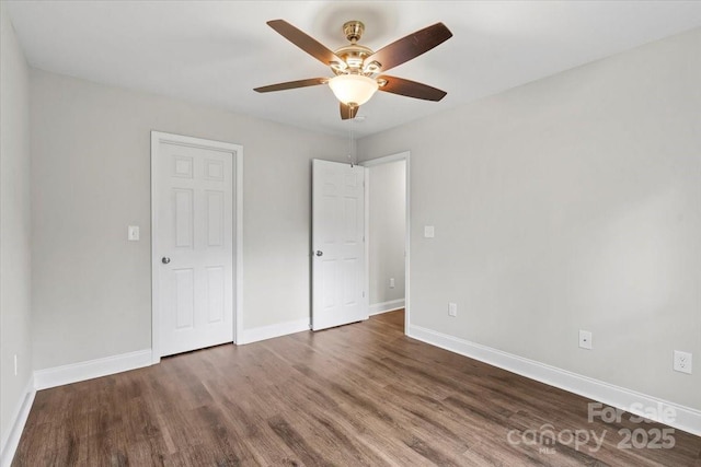 200 Mosley Rd, Blacksburg, SC 29702 - unfurnished bedroom featuring wood finished floors, baseboards, and a ceiling fan