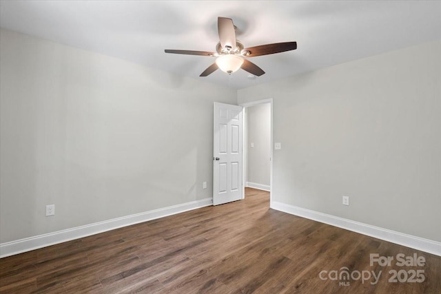 200 Mosley Rd, Blacksburg, SC 29702 - unfurnished room with a ceiling fan, dark wood-style floors, and baseboards
