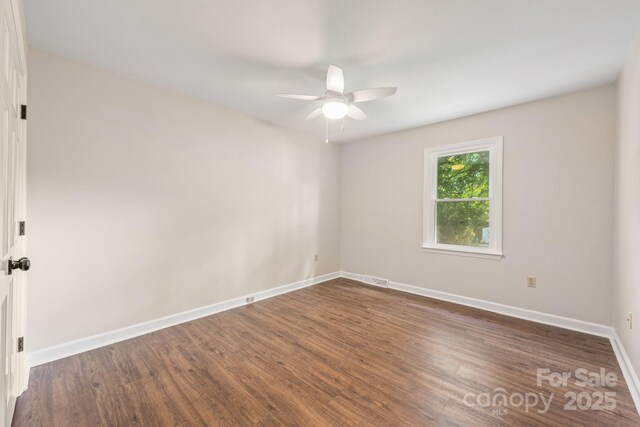 3101 Willowbrae Rd, Charlotte, NC 28226 - spare room featuring ceiling fan, baseboards, and dark wood-style flooring