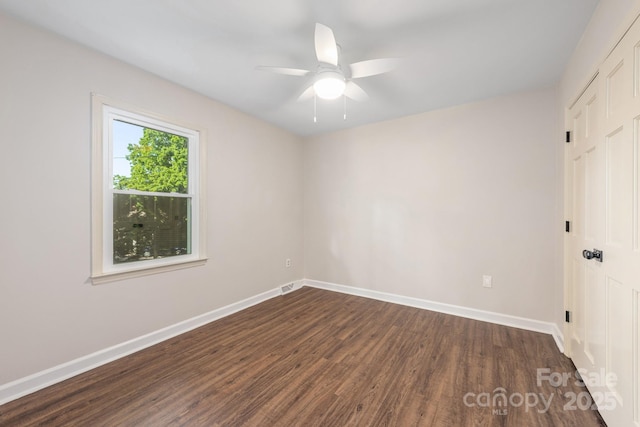 3101 Willowbrae Rd, Charlotte, NC 28226 - spare room with dark wood finished floors, a ceiling fan, and baseboards