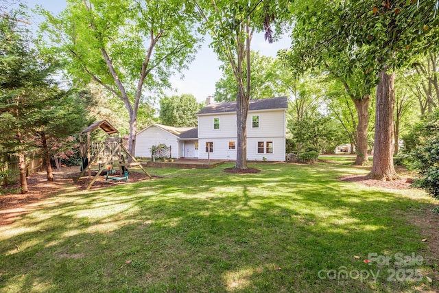 3101 Willowbrae Rd, Charlotte, NC 28226 - rear view of property featuring a playground and a chimney