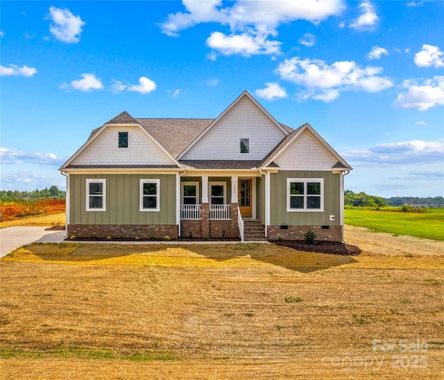 LOT101 Coppergate Dr, Salisbury, NC 28147 - craftsman house featuring crawl space, covered porch, board and batten siding, and a front yard