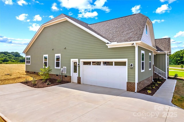 LOT101 Coppergate Dr, Salisbury, NC 28147 - view of side of property with board and batten siding, roof with shingles, a garage, driveway, and crawl space