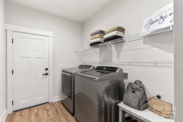 LOT101 Coppergate Dr, Salisbury, NC 28147 - laundry room with light wood-style flooring and separate washer and dryer