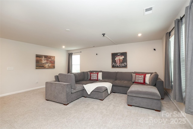 1119 Bellshill Dr, Indian Trail, NC 28079 - living room with light colored carpet, healthy amount of natural light, recessed lighting, and baseboards