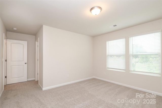 1119 Bellshill Dr, Indian Trail, NC 28079 - unfurnished room featuring light carpet, baseboards, and a smoke detector