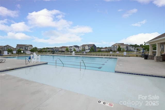 1119 Bellshill Dr, Indian Trail, NC 28079 - community pool with a residential view, fence, and a patio