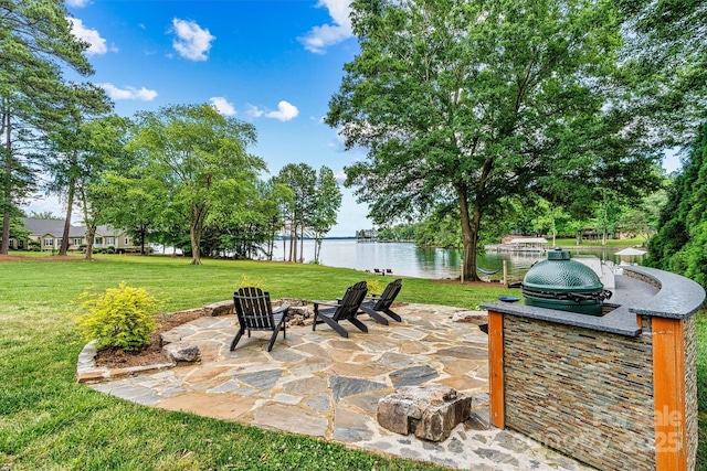 8218 Bright Water Ln, Denver, NC 28037 - view of patio featuring a water view and an outdoor fire pit