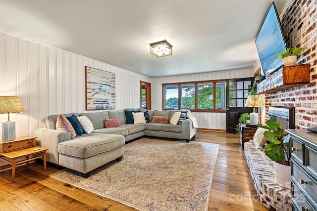 8218 Bright Water Ln, Denver, NC 28037 - living area featuring wood-type flooring and a fireplace