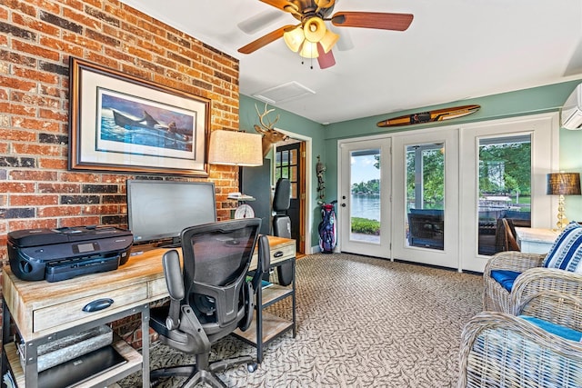 8218 Bright Water Ln, Denver, NC 28037 - carpeted home office with brick wall and a ceiling fan