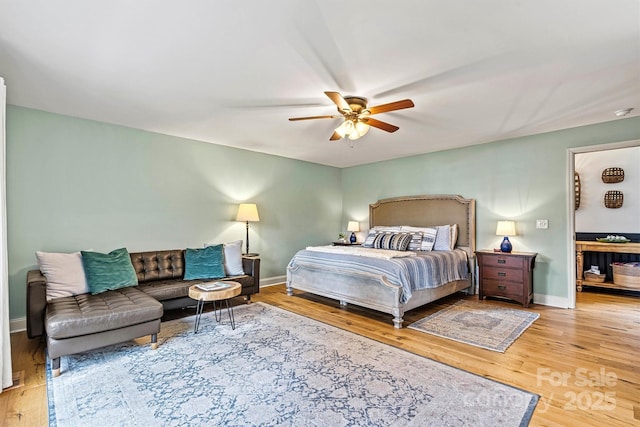 8218 Bright Water Ln, Denver, NC 28037 - bedroom featuring wood finished floors and ceiling fan