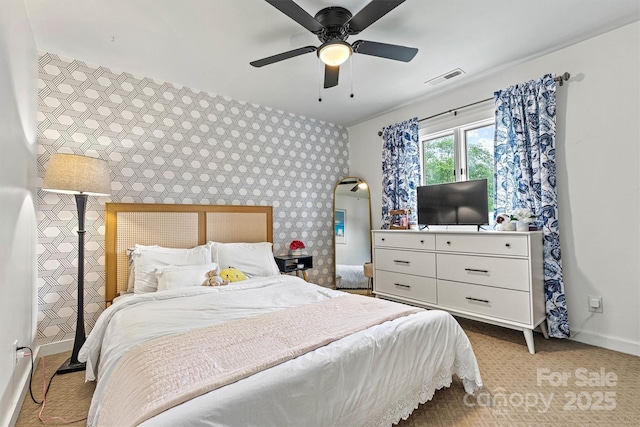 8218 Bright Water Ln, Denver, NC 28037 - bedroom with wallpapered walls, an accent wall, and ceiling fan