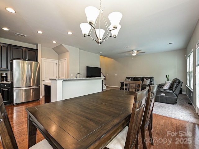 1769 Evergreen Dr, Charlotte, NC 28208 - dining area with dark wood-type flooring, recessed lighting, a chandelier, and ceiling fan