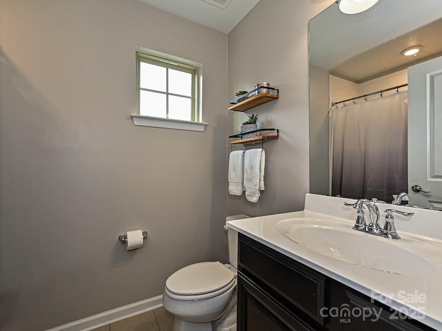 1769 Evergreen Dr, Charlotte, NC 28208 - full bath featuring vanity, tile patterned flooring, and a shower with shower curtain