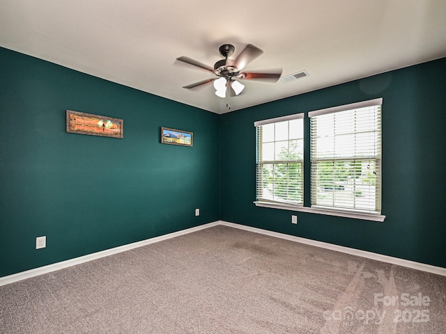 1769 Evergreen Dr, Charlotte, NC 28208 - carpeted empty room featuring a ceiling fan and baseboards