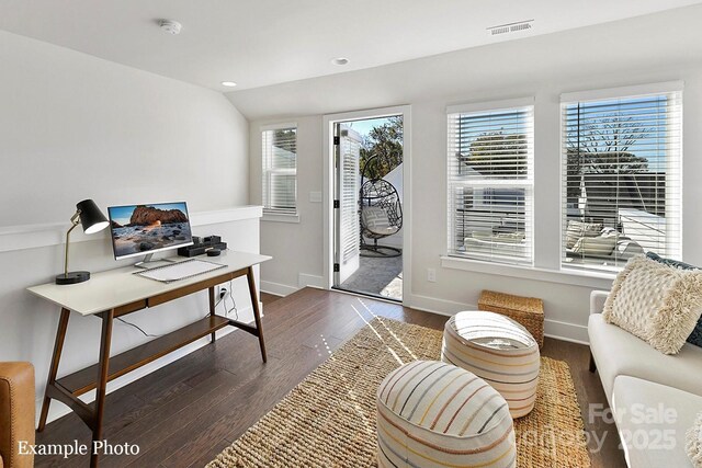 home office with wood finished floors, plenty of natural light, recessed lighting, and baseboards