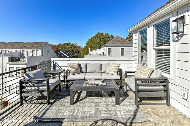 view of patio / terrace with outdoor lounge area and a balcony