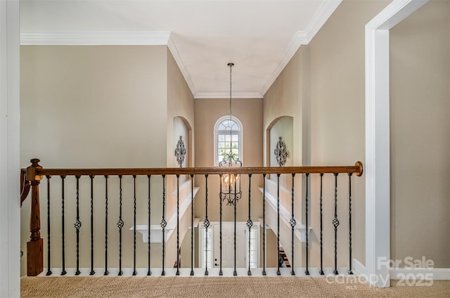 detailed view of crown molding and a chandelier