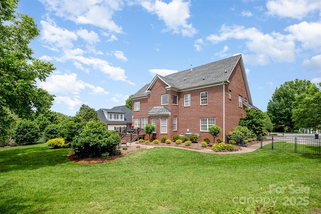 view of front of property with brick siding and a wooden deck