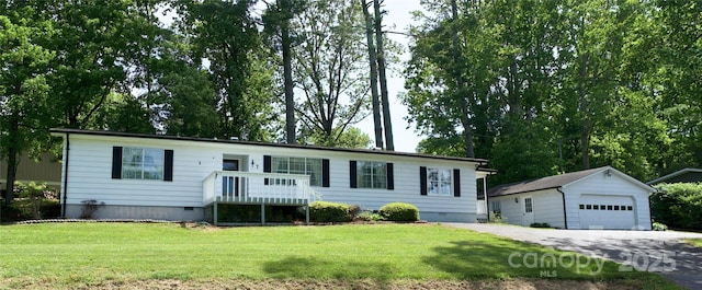 7 Lakewood Rd, Hendersonville, NC 28792 - ranch-style home featuring an outbuilding, a garage, a front lawn, and crawl space