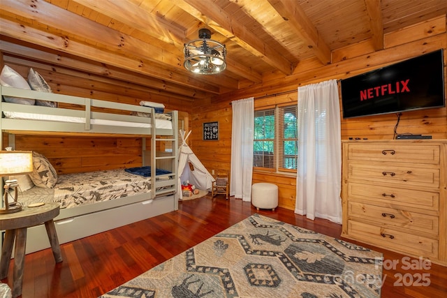 45 Ginger Ln, Waynesville, NC 28785 - bedroom featuring wooden walls, beam ceiling, wood ceiling, and dark wood-type flooring