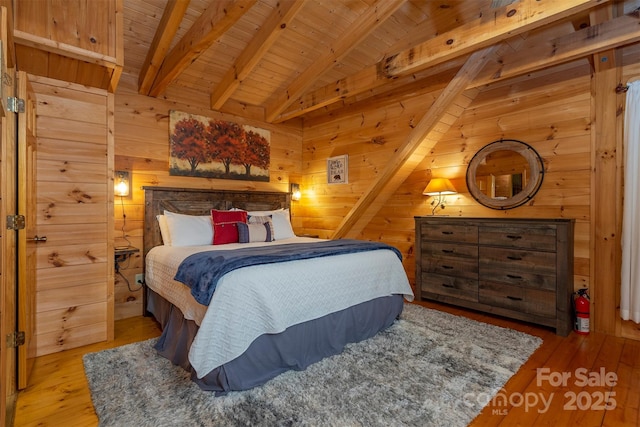 45 Ginger Ln, Waynesville, NC 28785 - bedroom featuring wooden walls, wood ceiling, and wood finished floors