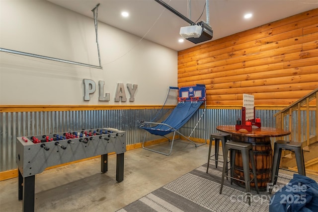 45 Ginger Ln, Waynesville, NC 28785 - playroom featuring concrete flooring, recessed lighting, and log walls